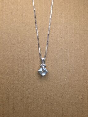 Sterling Silver Aquamarine Solitaire Pendant Necklace With Diamond Accent.